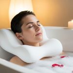 relaxing in bathtub with luxury quick-dry spa bath pillow supporting neck and shoulders