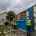Tampa home wall reconstruction with moisture barrier installation